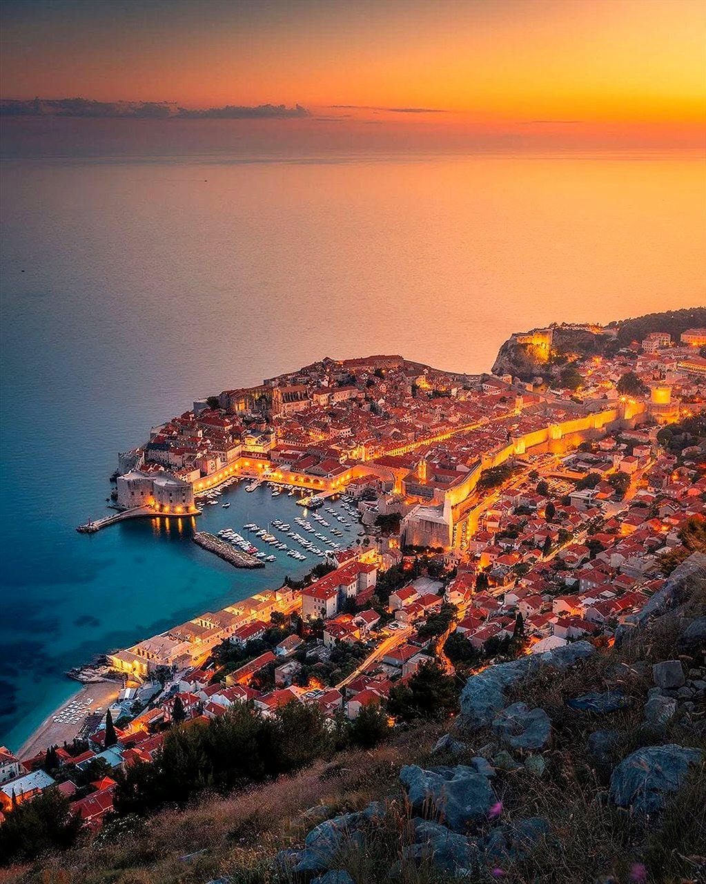 Sunset over Dubrovnik's Old Town and the Adriatic islands seen from Mount Srđ